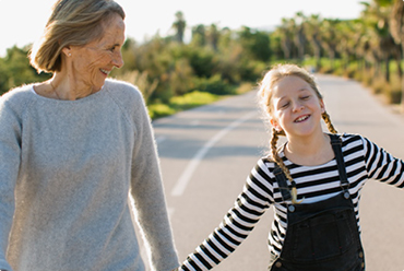 Woman and Girl walking down road